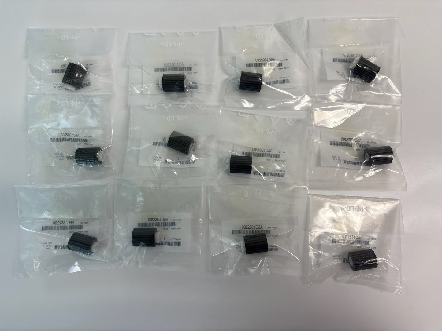 12 Genuine Konica BH 223,224e,227,283 New Style Ribbed Pickup Roller A5C1562200