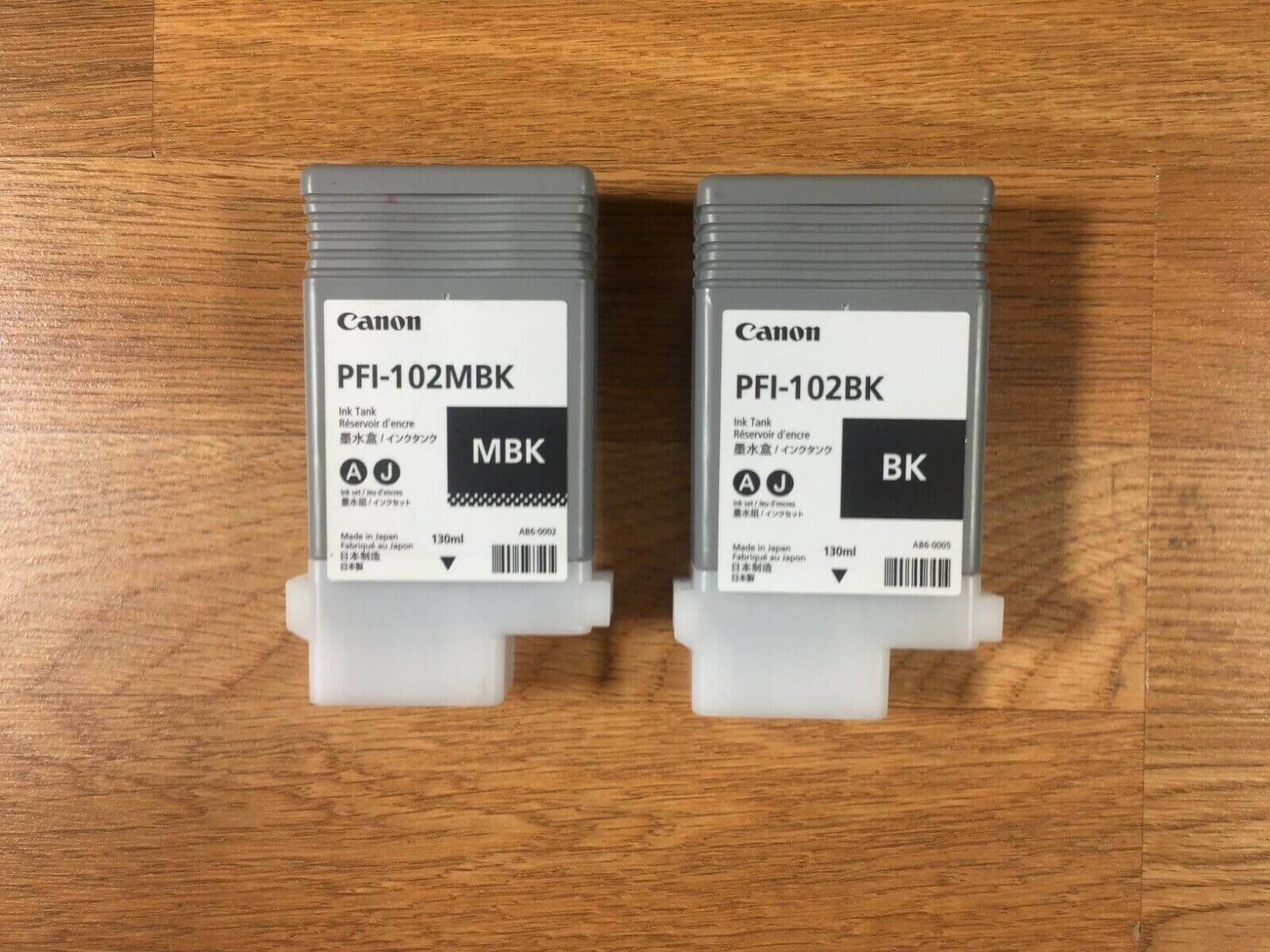 2 Barley Used PFI-102 Black & Matte Black For ImagePROGRAF iPF500 - copier-clearance-center